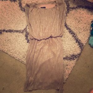 A sparkling gold dress!